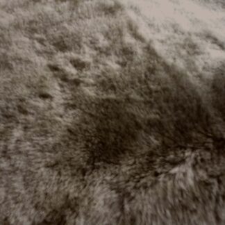 Green smooth soft sheep hair on leather hide