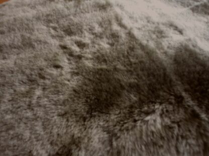 Green smooth soft sheep hair on leather hide