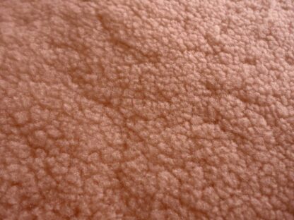 Champagne Pink Curly Sheep Hair On leather hide