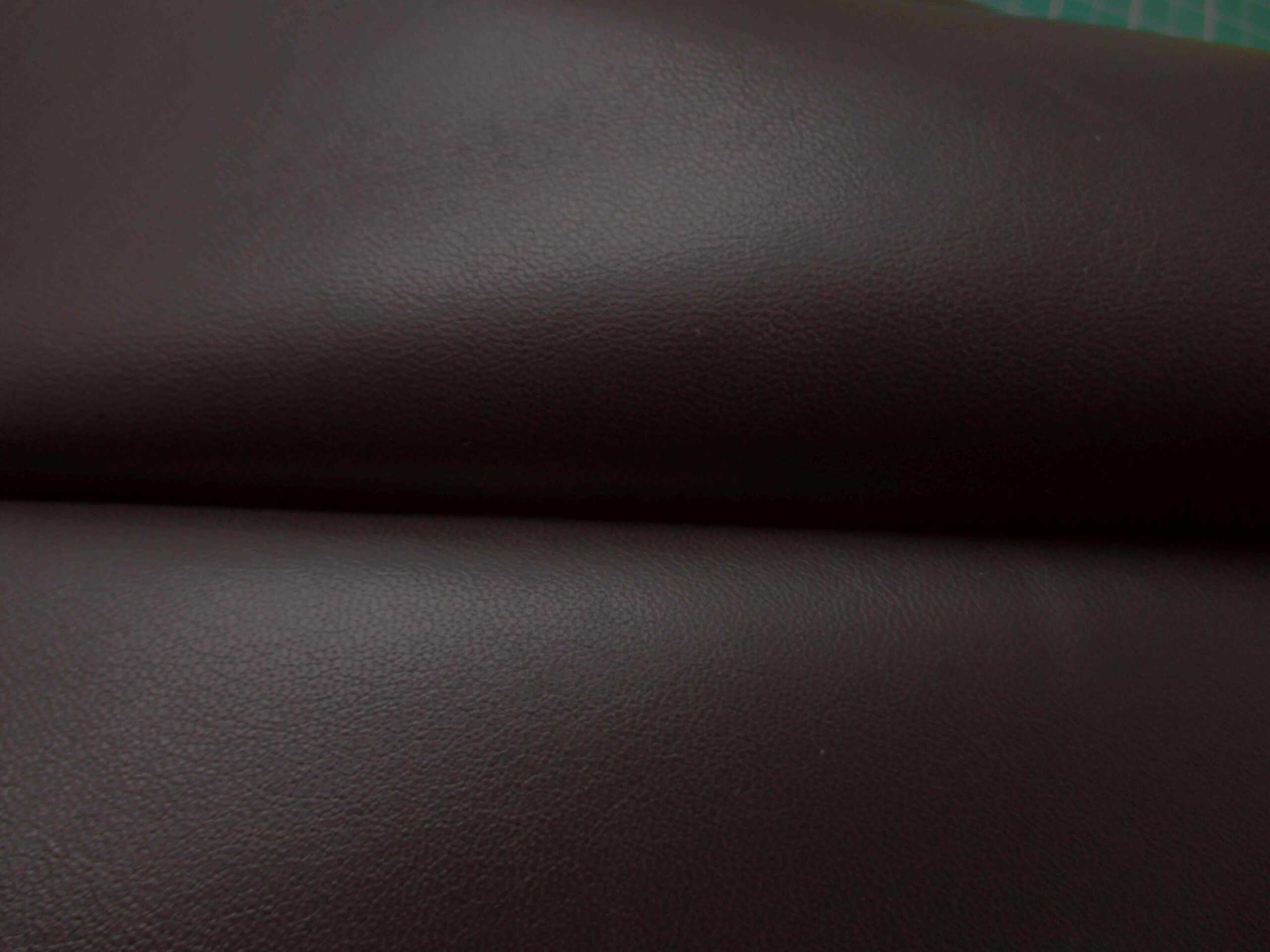 Very dark brown Smooth soft leather